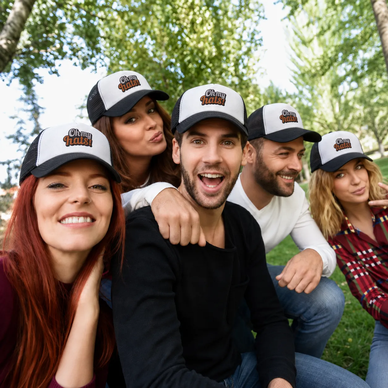 Five friends wearing black and white foam trucker hats embroidered with the Oh My Hats logo outdoors
