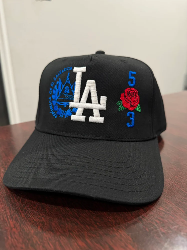 Black custom 5 panel baseball hat with colorful LA and rose embroidery design