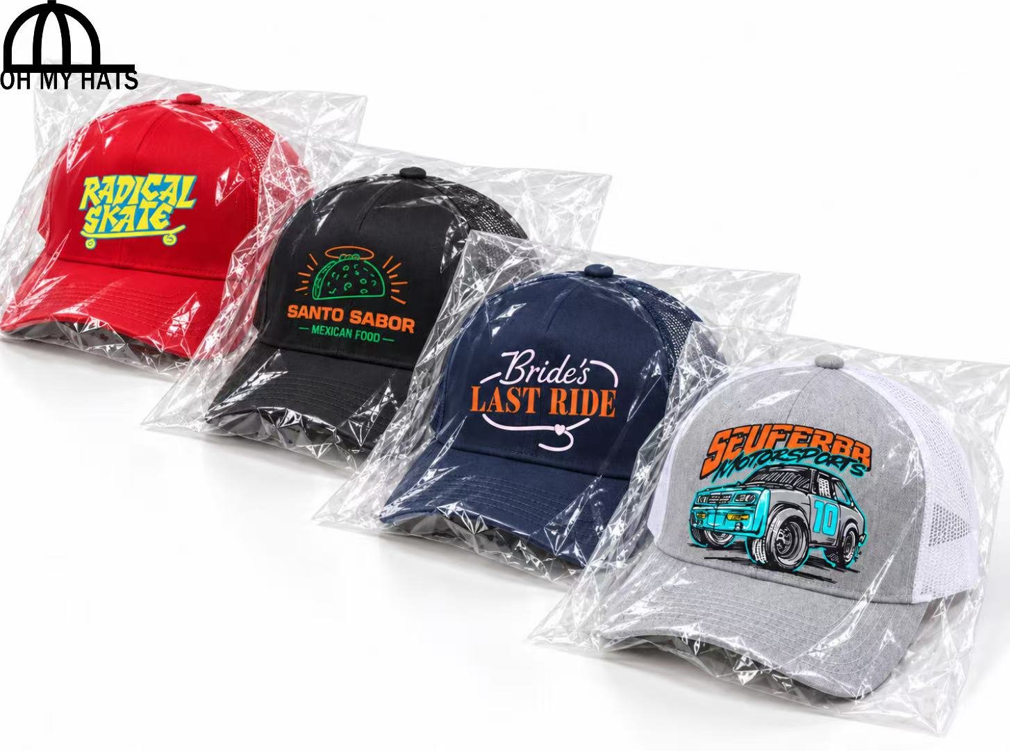 Four custom printed trucker hats individually wrapped in clear plastic bags on a white background.